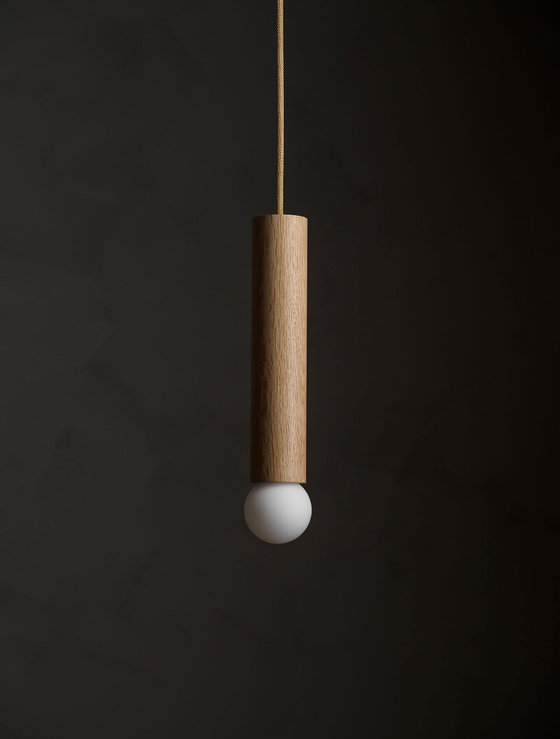Wood Cylinder Pendant 12" shown in White Oak, Matte White Globe